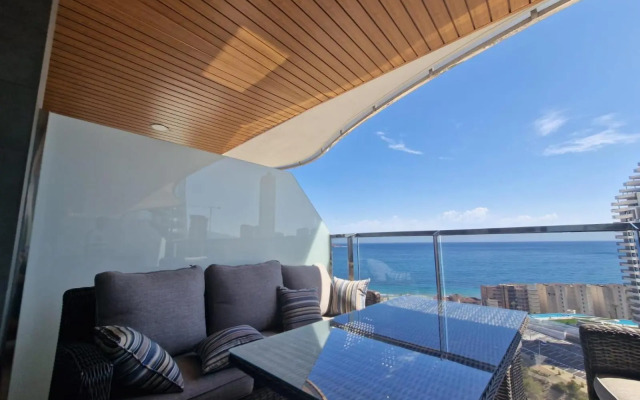 SUNSET WAVES vistas al mar