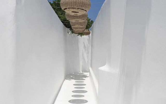 O by Myconian Collection