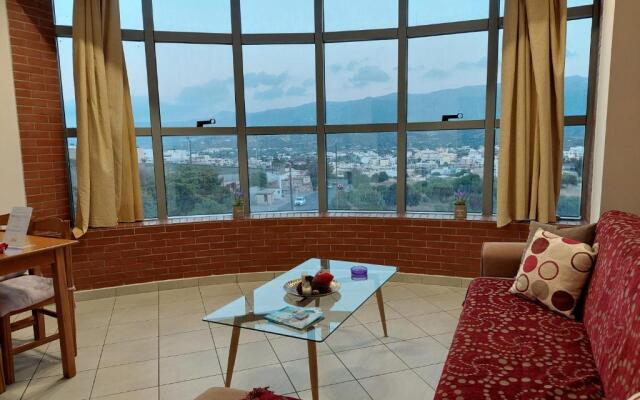 Glass Building Apartment in Sitia