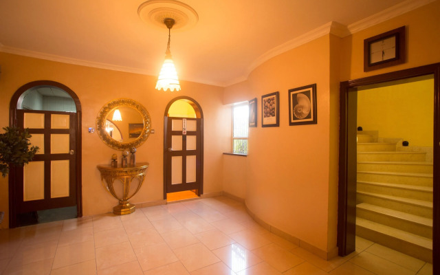 Quiet Pools Inn and Residence