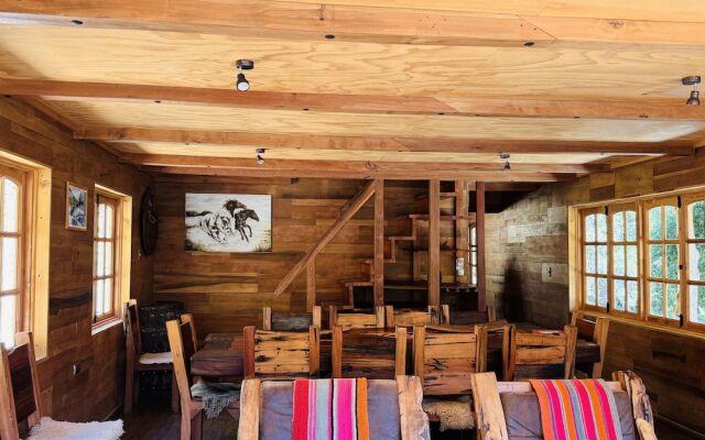 Cabañas entre montañas con tinajas calientes