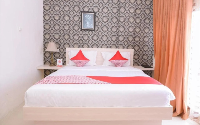 Capital O 854 Ub Caisar Hotel