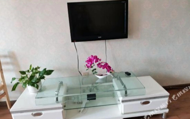 Qingqing Wojia Hotel Style Apartment