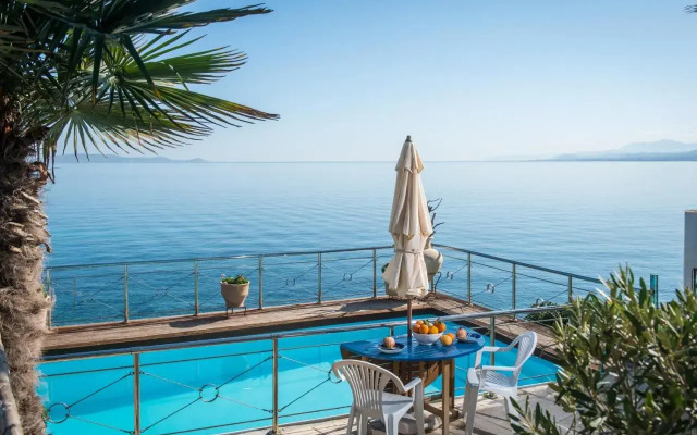 Exclusive Seaside Retreat with Shared Pool & Private Beach Access
