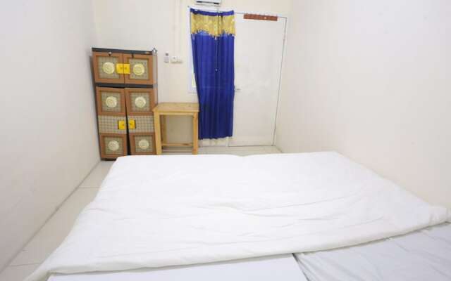 SPOT ON 93827 Rumah Kost Harapan Indah