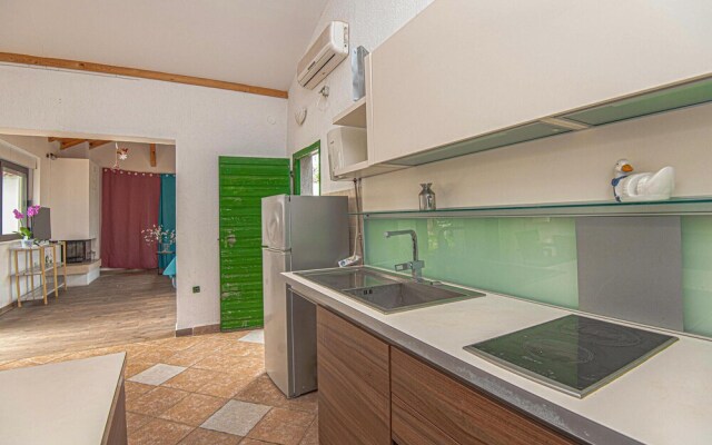 Awesome Home in Jezera with Hot Tub, WiFi & 1 Bedrooms