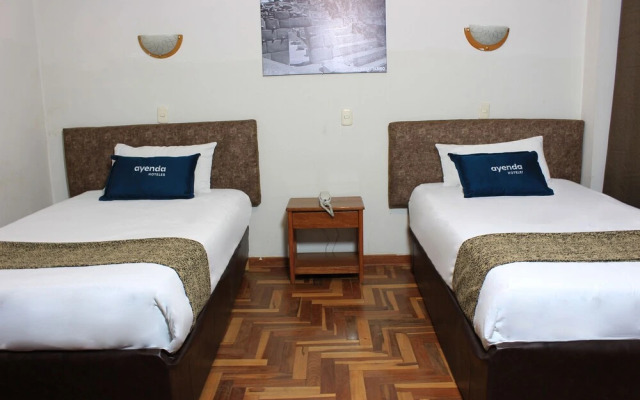 Hotel Pumas Inn