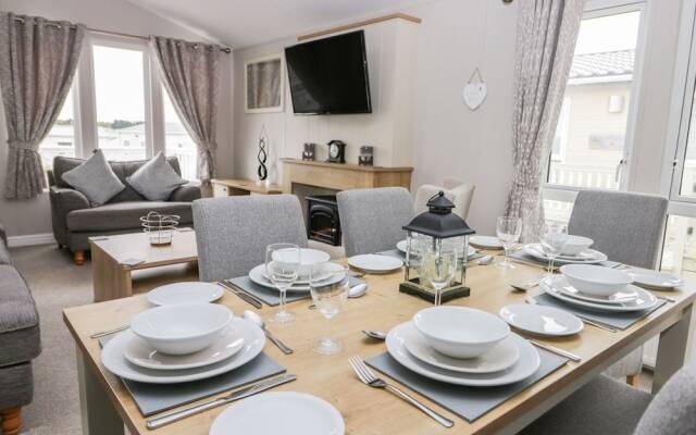 Cayton Pines Lodge at Cayton Bay Holiday Park