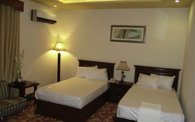 Raj One Hotel