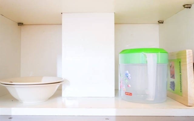 Monochrome Style 2 Bedrooms at Kalibata City Apartment By Travelio