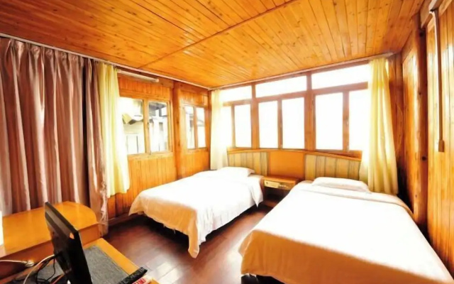 Guzhuang Family Hotel – Guest Rooms – Guilin