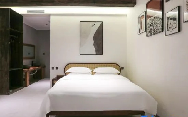 Weiman Hotel (Qingtai Century Plaza)