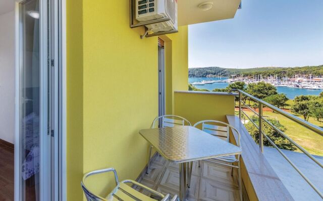 Awesome Apartment in Pomer With 2 Bedrooms