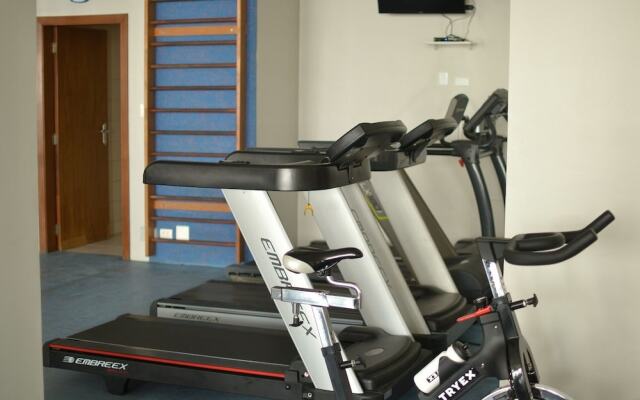 150m da praia com piscina aquecida e sauna