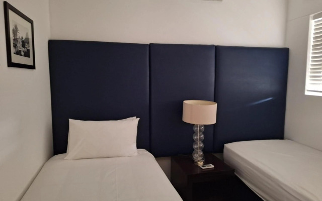 Genesis All-Suite Hotel