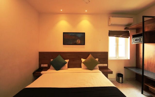 Capital O 18266 Hotel Arunaa Inn
