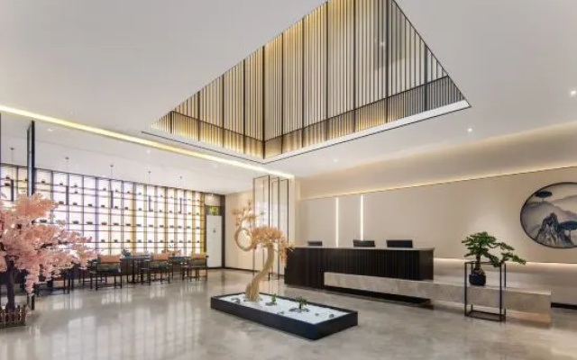 Moshang Light House Hotel (Zhengzhou South China City Longhu Jinyicheng Shopping Center) — фото 2