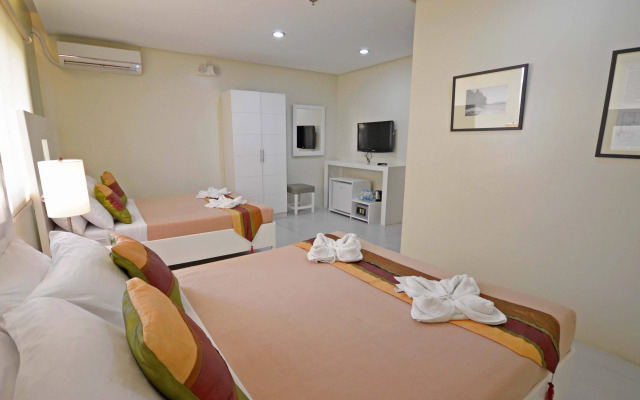Holiday Suites Business District (Empire Suites Hotel)