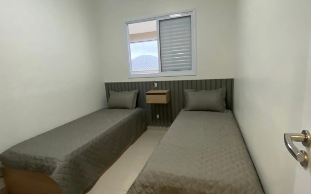 Apartamento em Bertioga com varanda gourmet