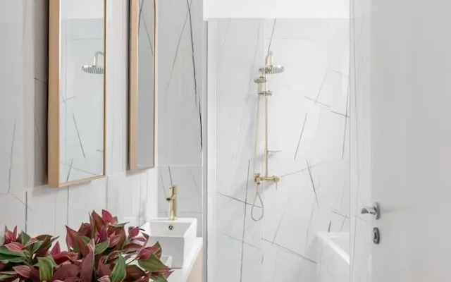 Luxury Piata Romana 2BR Urban Sanctuary by HOLT