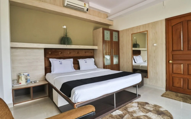 Holiday Palms by OYO Rooms