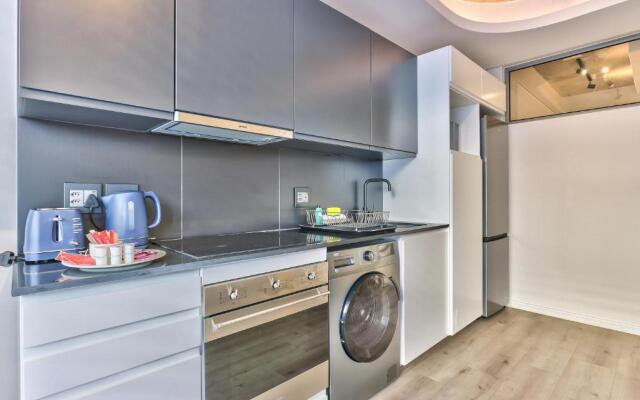 One Bedroom With Balcony and City Views