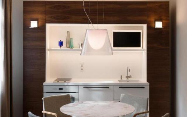 Design Central Studio Apartment with Balcony by Hostlovers