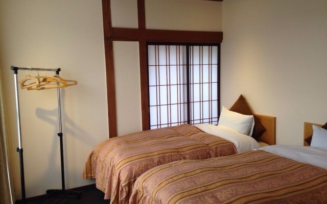 Hakuba West Coast Inn Villa – Guest Rooms – Hakuba
