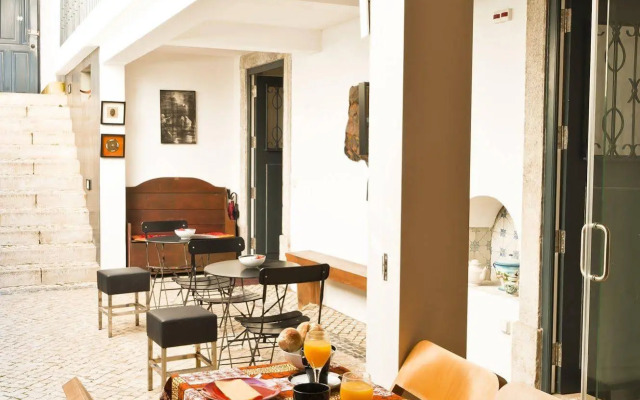 Casa do Bairro by Shiadu
