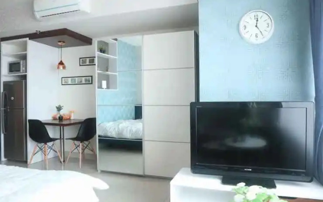 Apartemen Grand Kamala Lagoon Cozy by Lotus Property