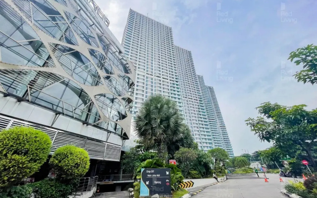 RedLiving Apartemen Grand Kamala Lagoon by owner room