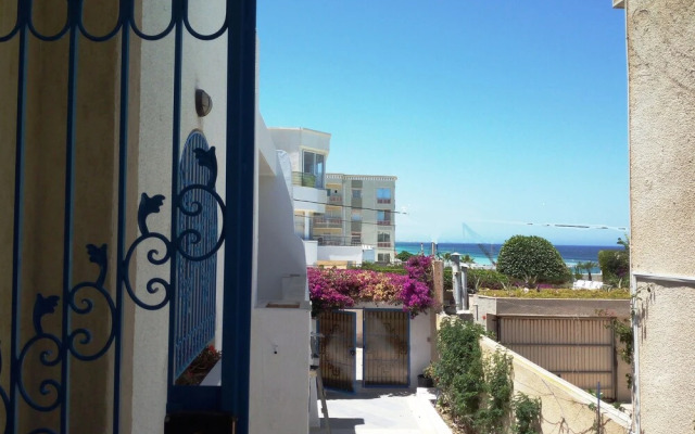 Partie de pittoresque maison en bord de mer