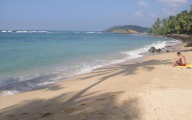 SunRay Rest - Beach View Homestay