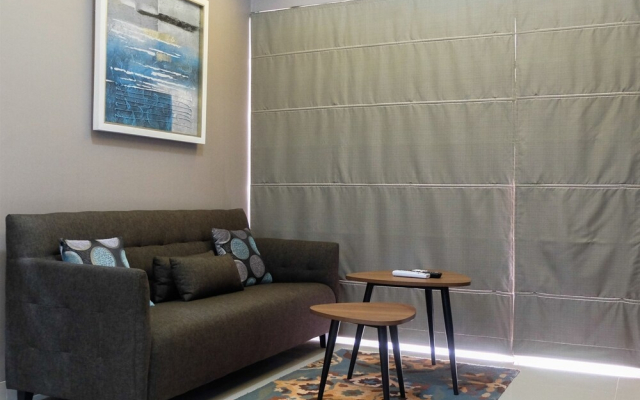 Comfortable 2BR @The Oasis Apartment By Travelio