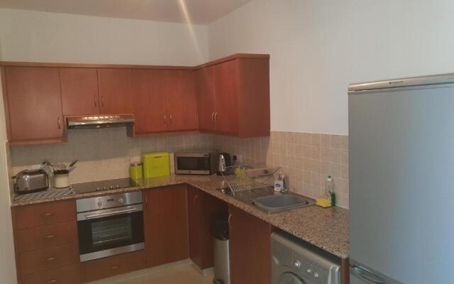 Stunning apartment C106 with balcony looking over pool