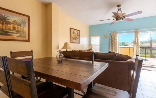Private Screened Splash Pool Overlooking Tranquil Lake Right Beside Disney World by Florida Dream Homes