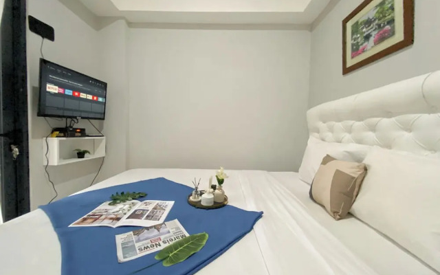 Minimalist And Cozy 1BR at Royal Heights Apartment