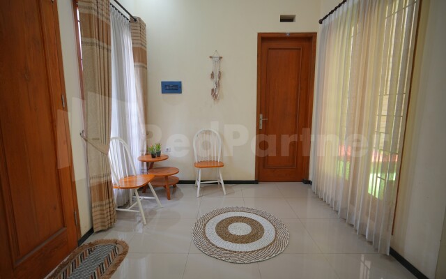 One & Quin Guest House Syariah