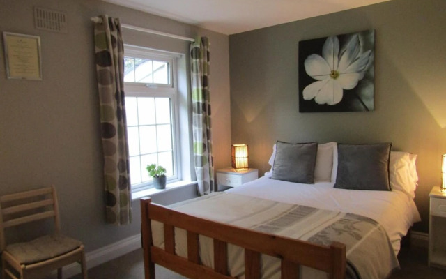 The Rose Garden Bed & Breakfast and Cafe