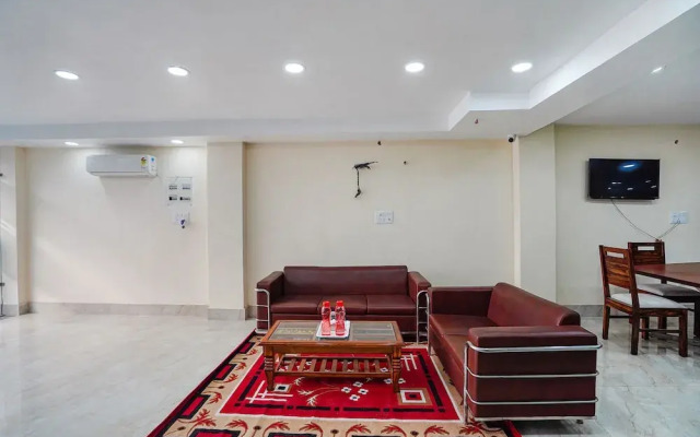 Fabhotel Ada Residency