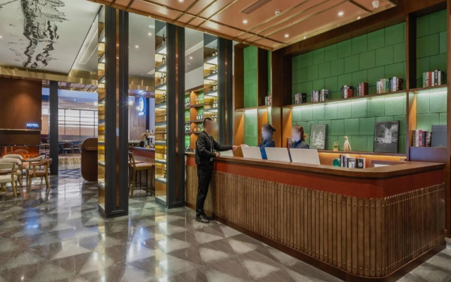 Manxin Hotel Qingdao Zhanqiao