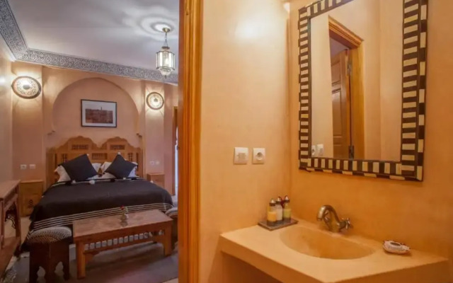 "room in Guest Room - Riad Lakouas Triple Room With Pool View"