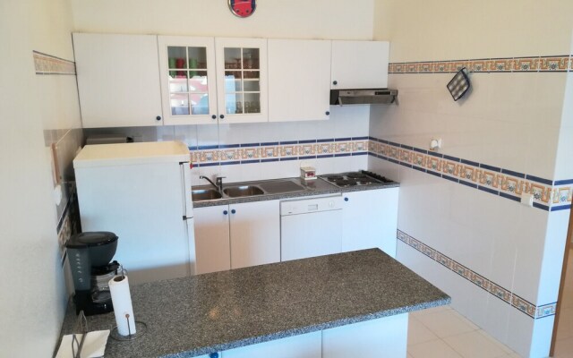 Apartamento Praia de Porches,izibookings