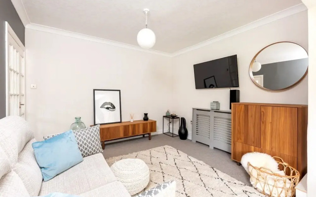 Modern, Deceptively Spacious & Beautifully Bright!