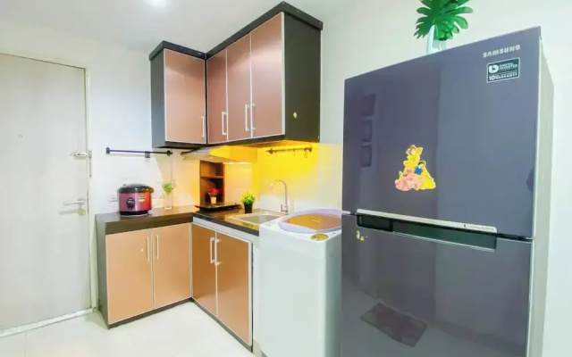 Simple 2Br At Azalea Suites Apartment