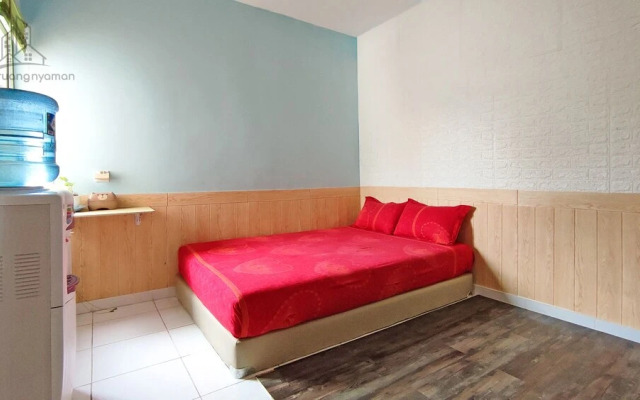 Elis Room at Aeropolis by Ruang Nyaman