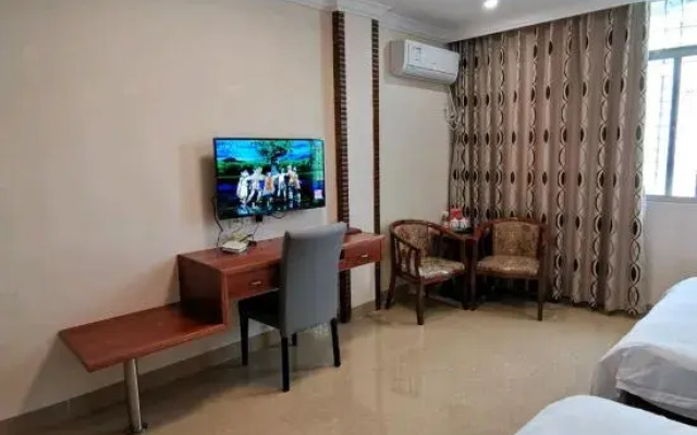 Wuhua Yihao Business Hotel