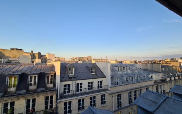 Appartement Cœur de Paris avec vue sur les toits
