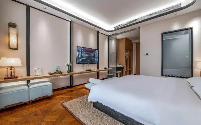 Blossom Hill Hotel Qingdao Aduohuayu