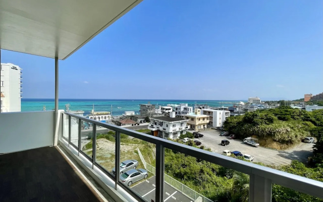 Coral Palace Onna by Sunset Avenue